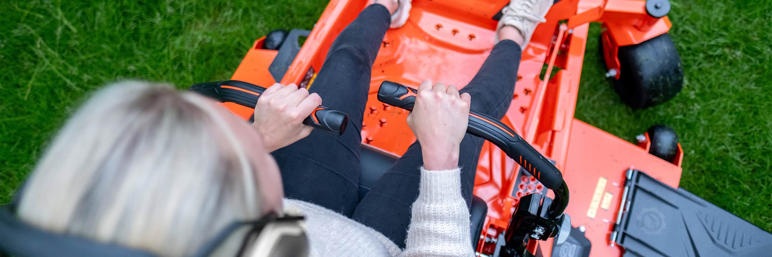 Top down shot of the Ariens Zero-Turn handle bars, showcasing the steering with a Zero-Turn mower