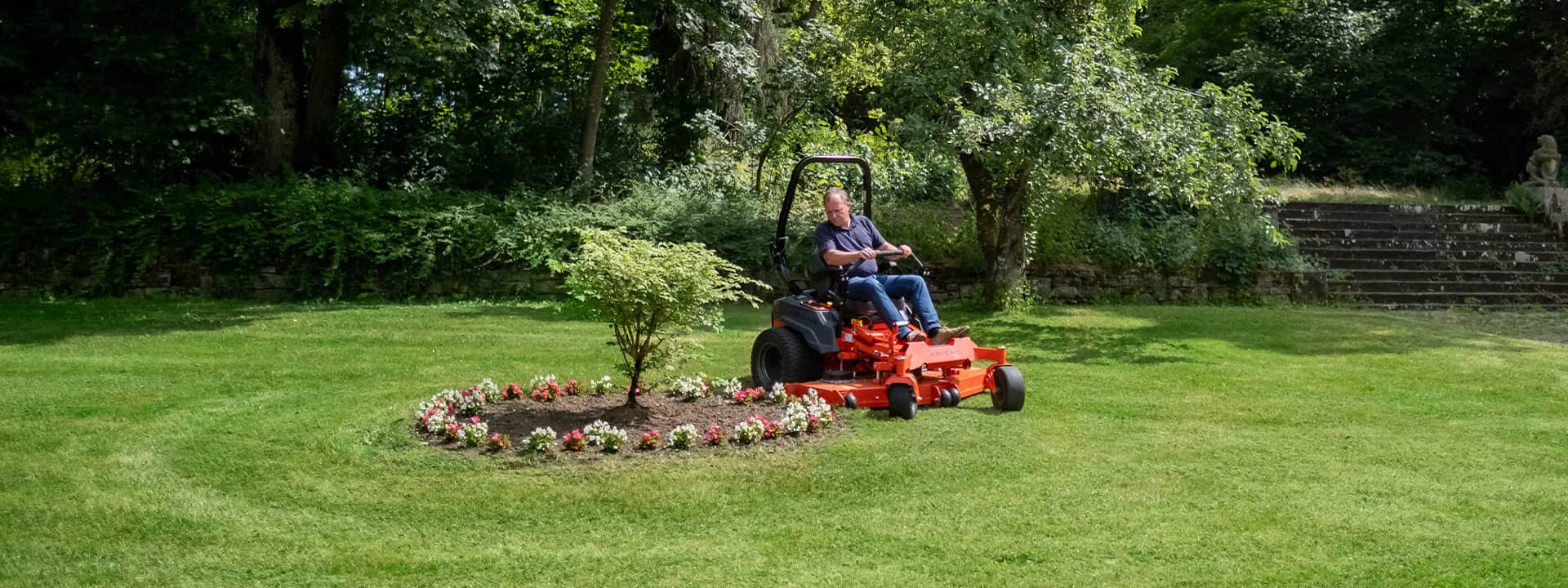 Ariens Zero-Turn mower, driving precisely along a flower bed