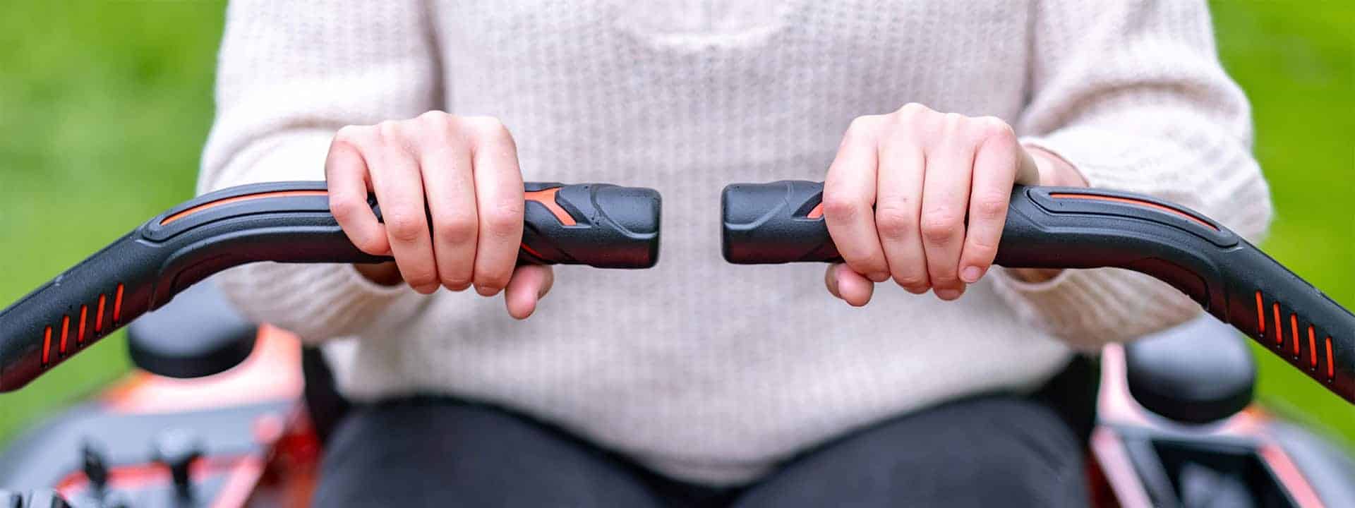 Top down shot of the Ariens Zero-Turn handle bars, showcasing the steering with a Zero-Turn mower