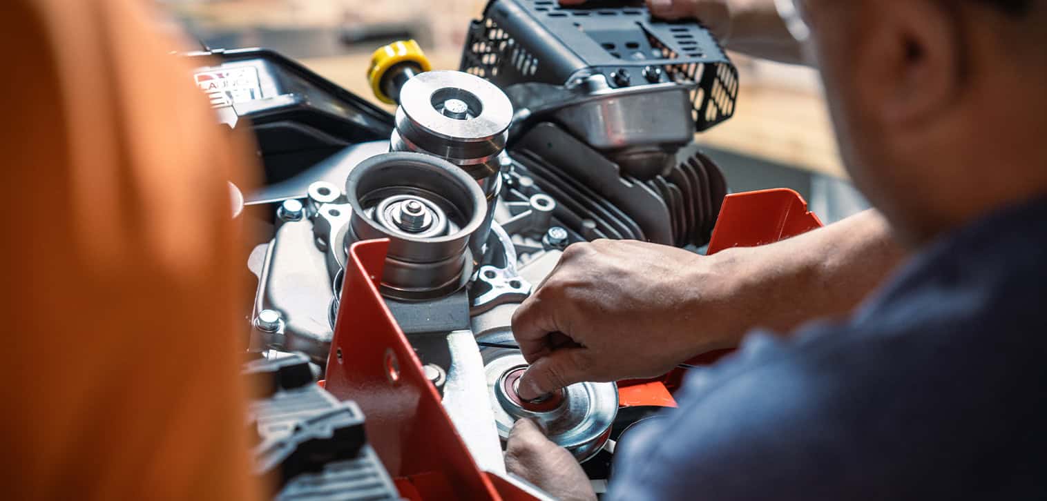 Ariens factory worker, working on assembling a brand new Zero-Turn mower